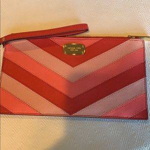 Michael Kors Jet Set large zip leather clutch